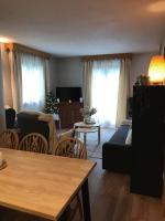 Televízia a/alebo spoločenská miestnosť v ubytovaní Appartement rez-de-chaussée, Cosy T3 4 à 6 pers avec Piscines Intérieure & Extérieure à Samoëns en Haute-Savoie
