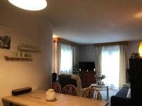 Televízia a/alebo spoločenská miestnosť v ubytovaní Appartement rez-de-chaussée, Cosy T3 4 à 6 pers avec Piscines Intérieure & Extérieure à Samoëns en Haute-Savoie