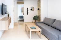 Televízia a/alebo spoločenská miestnosť v ubytovaní CALMA Apartments