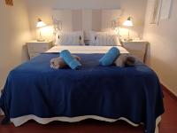 A bed or beds in a room at Sun And Chic Malaga