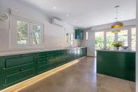 A kitchen or kitchenette at Villa Meretseger