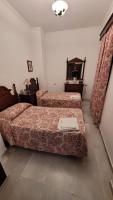 Posteľ alebo postele v izbe v ubytovaní Apartamento San Benito A