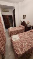 Posteľ alebo postele v izbe v ubytovaní Apartamento San Benito A