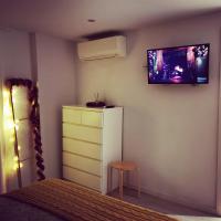 TV a/nebo společenská místnost v ubytování Laurel No5
