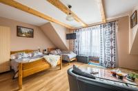 Posteľ alebo postele v izbe v ubytovaní Apartamenty u Bacy