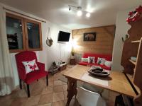 Televízia a/alebo spoločenská miestnosť v ubytovaní Appartement avec terrasse et parking Privé
