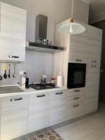 A kitchen or kitchenette at PRAIOLA BEACH HOUSE
