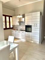 A kitchen or kitchenette at PRAIOLA BEACH HOUSE