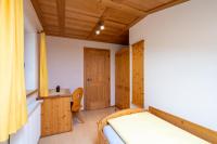 Postel nebo postele na pokoji v ubytování Grossgasteigerhof