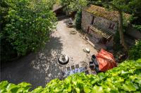 Vonkajšia záhrada v ubytovaní Le Moulin d'Anquet