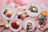 a bunch of plates of food on a pink table at Imperial Hotel Cork City in Cork