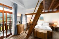 Postel nebo postele na pokoji v ubytování Pension Slunečnice & Panorama Restaurace Farma
