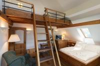 Postel nebo postele na pokoji v ubytování Pension Slunečnice & Panorama Restaurace Farma
