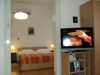 Televízia a/alebo spoločenská miestnosť v ubytovaní Apartment Horvat