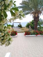 A garden outside Villa Stella Family House