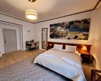 Łóżko lub łóżka w pokoju w obiekcie Witrina Apartments