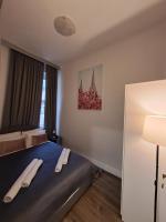 Łóżko lub łóżka w pokoju w obiekcie Witrina Apartments
