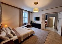 Łóżko lub łóżka w pokoju w obiekcie Witrina Apartments
