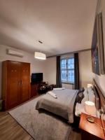 Łóżko lub łóżka w pokoju w obiekcie Witrina Apartments