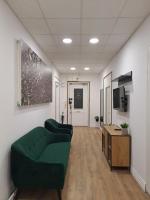Telewizja i/lub zestaw kina domowego w obiekcie Witrina Apartments