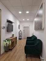 Telewizja i/lub zestaw kina domowego w obiekcie Witrina Apartments