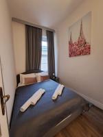 Łóżko lub łóżka w pokoju w obiekcie Witrina Apartments