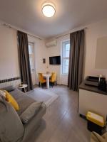 Telewizja i/lub zestaw kina domowego w obiekcie Witrina Apartments