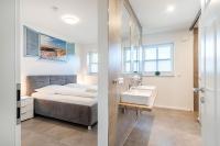 Postel nebo postele na pokoji v ubytování Ferienhaus Maira, mit Garten und Sauna
