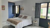 Posteľ alebo postele v izbe v ubytovaní CASA MORENA MiA APARTAMENTOS