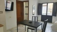 Televízia a/alebo spoločenská miestnosť v ubytovaní CASA MORENA MiA APARTAMENTOS