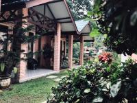 Een tuin van Thomas' Retreat Bukit Lawang