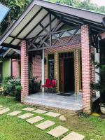 Een tuin van Thomas' Retreat Bukit Lawang