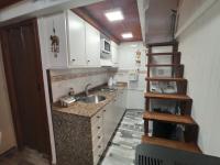 Kuchyň nebo kuchyňský kout v ubytování La Casita
