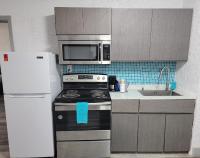 Deluxe Queen Room with Full Kitchen and Gulf View (No Resort Fee)