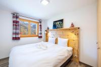 Chalet Amerhone - Luxury chalet With Jacuzziにあるベッド