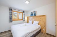 Chalet Amerhone - Luxury chalet With Jacuzziにあるベッド