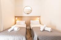 Postel nebo postele na pokoji v ubytování Suncanarias Hotel Adeje Plaza