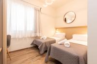 Postel nebo postele na pokoji v ubytování Suncanarias Hotel Adeje Plaza