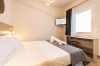Postel nebo postele na pokoji v ubytování Suncanarias Hotel Adeje Plaza