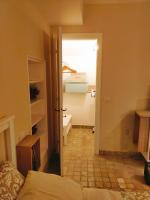 A bed or beds in a room at MancioBiba Home