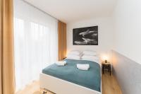 Posteľ alebo postele v izbe v ubytovaní Apartament SUBMARINE SurfingBird Dźwirzyno