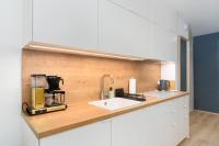 Kuchyňa alebo kuchynka v ubytovaní Apartament SUBMARINE SurfingBird Dźwirzyno