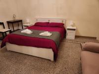 Posteľ alebo postele v izbe v ubytovaní La grande casa di Puglia