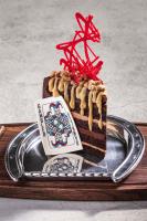 a piece of cake on a plate on a table at Horseshoe Las Vegas in Las Vegas