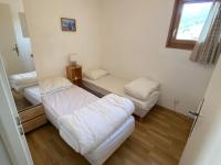 Posteľ alebo postele v izbe v ubytovaní Appartement lumineux et spacieux au centre de Châtel, proche télécabine et Multi Pass inclus! - FR-1-693-9