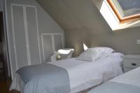 Postel nebo postele na pokoji v ubytování Precioso Ático dúplex en Canfranc, Casa Marco
