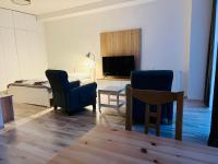 A television and/or entertainment centre at Apartmán Liptov NP9