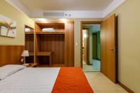 Tri Hotel Executive Caxiasにあるベッド