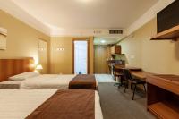 Tri Hotel Executive Caxiasにあるベッド