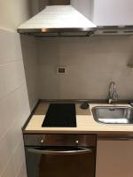 A kitchen or kitchenette at La dolce Frascati Home